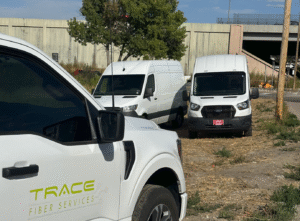 Trace Fiber splice vans responding to a telecom network damage in Denver Colorado